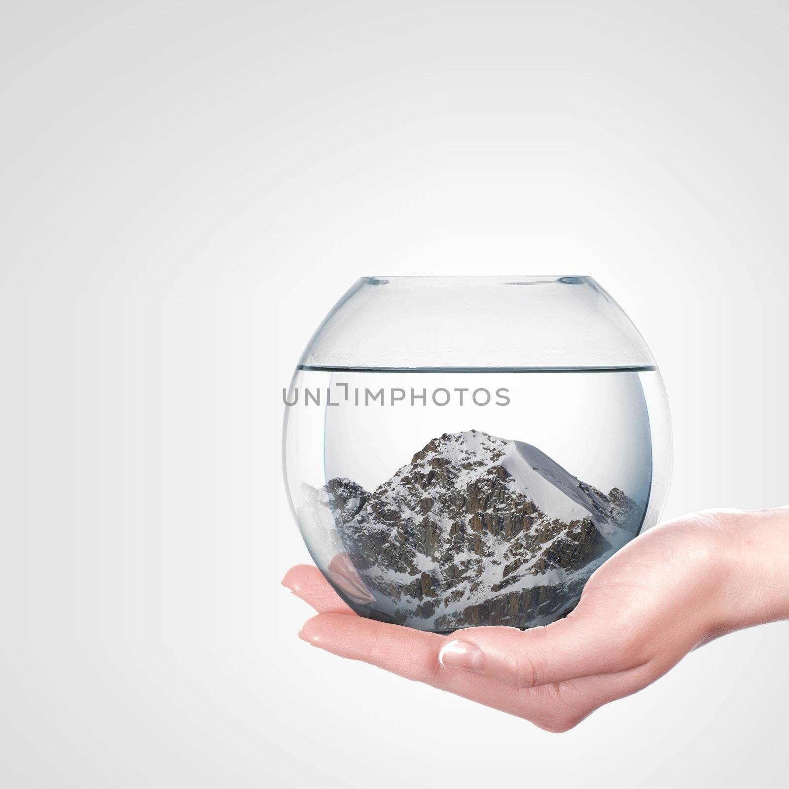 Beautiful snow-capped mountains inside a glass bowl