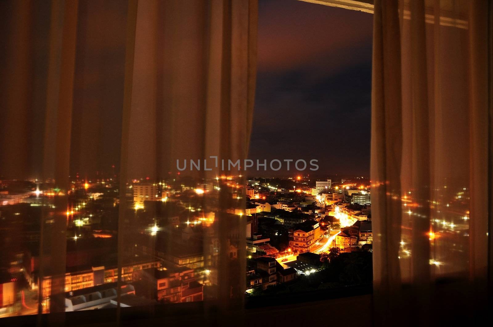 view on city of Trang,Thailand  in a night from a hotel room