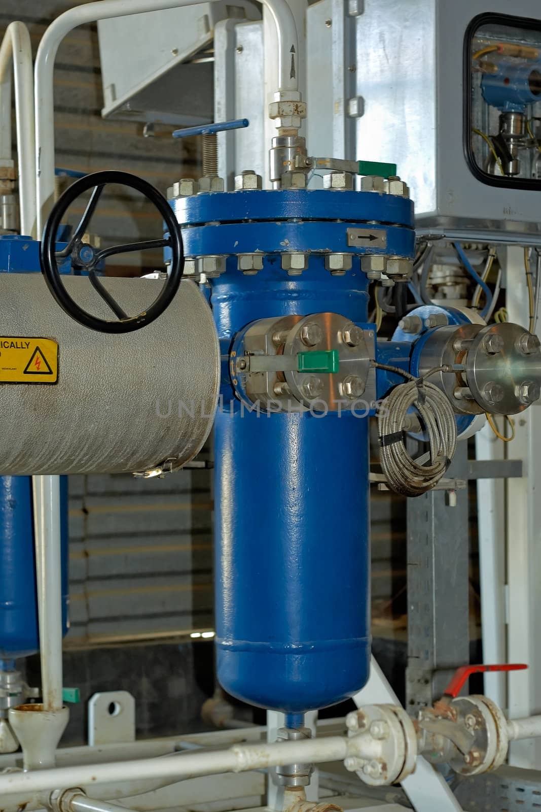 Industrial filters blue on of petroleum pipeline.
