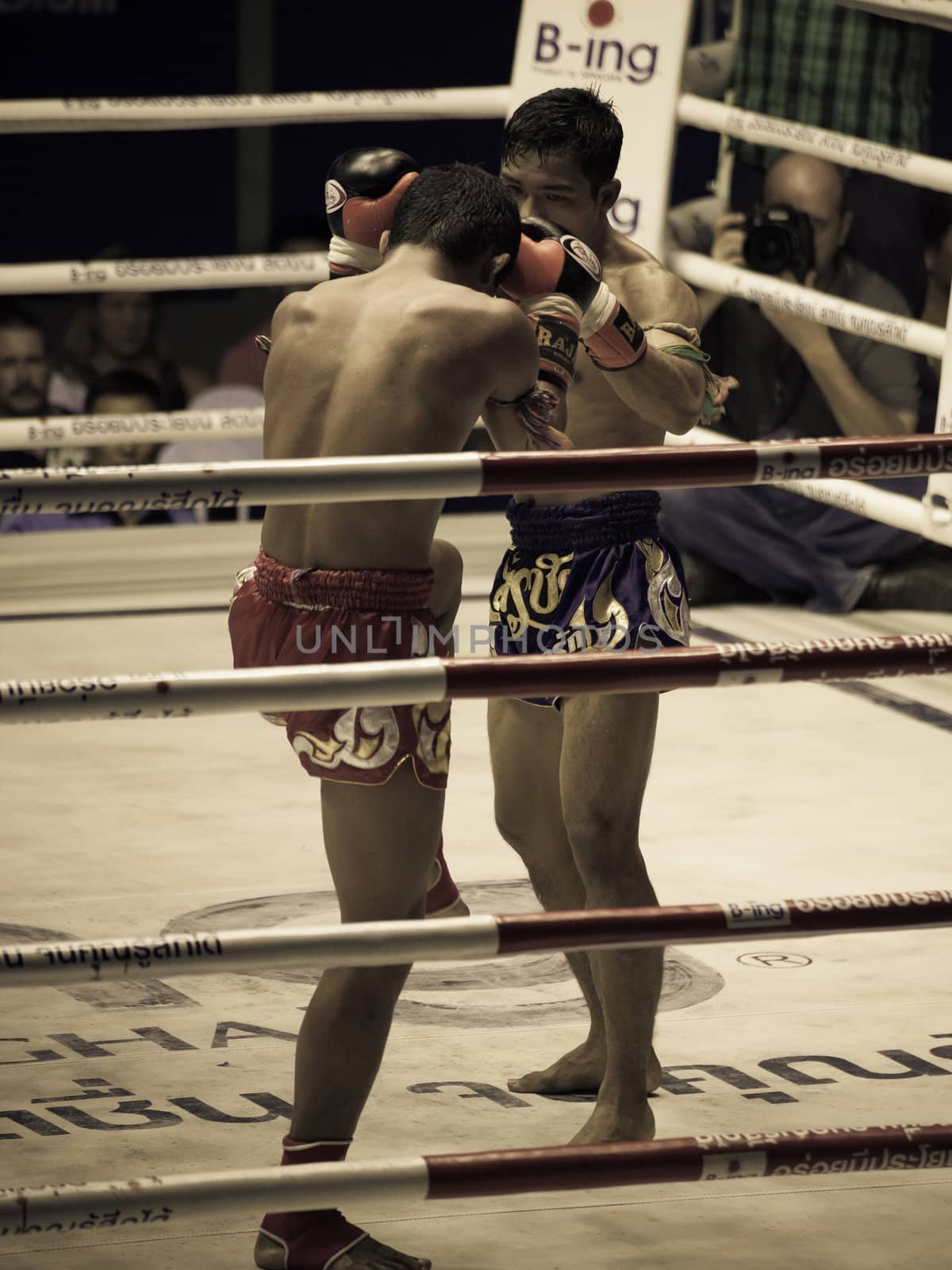 BANGKOK, THAILAND- OCTOBER 04 : Unidentified boxers compete in Thai Fight: Muay Thai Charity on October 04, 2012 at Rajadamnern Stadium in Bangkok, Thailand