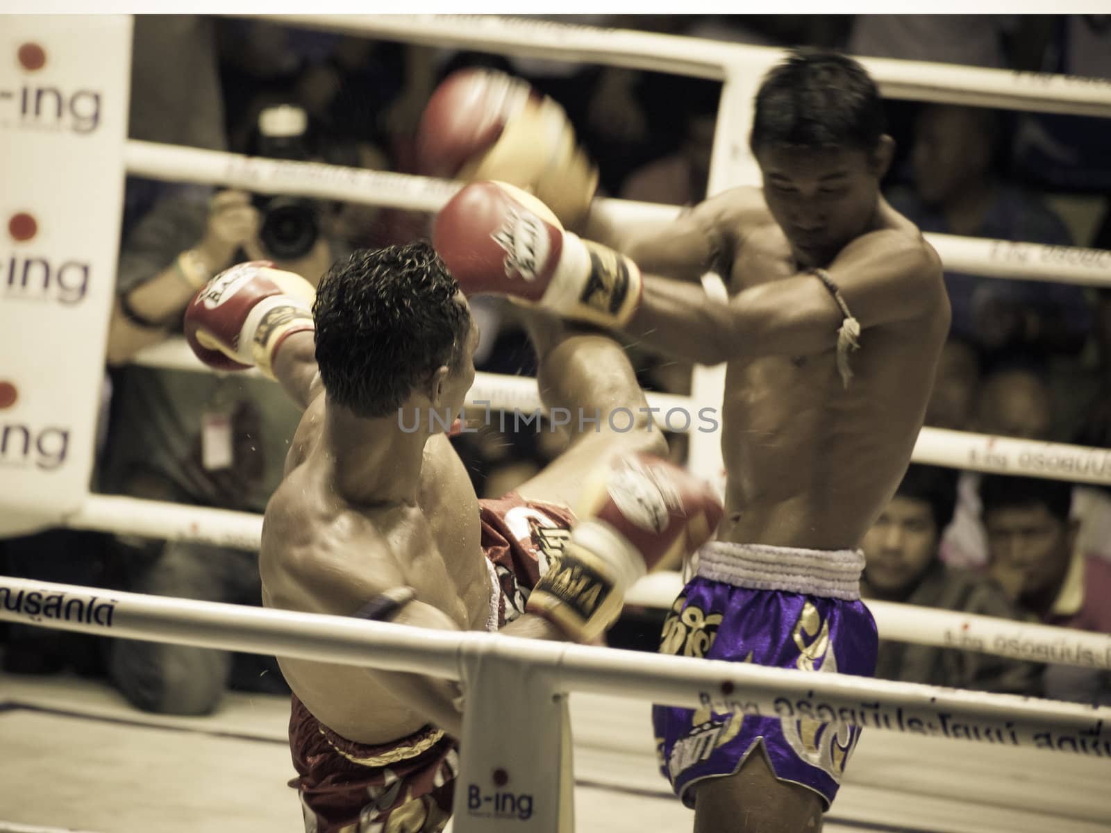 BANGKOK, THAILAND- OCTOBER 04 : Unidentified boxers compete in Thai Fight: Muay Thai Charity on October 04, 2012 at Rajadamnern Stadium in Bangkok, Thailand