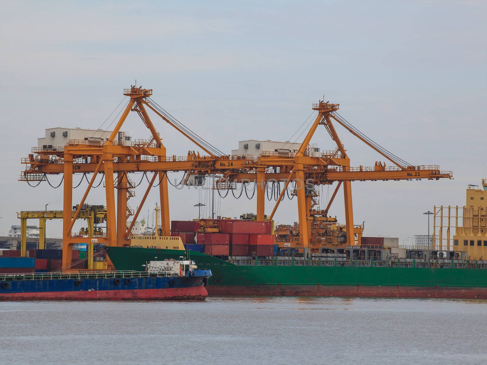Logistic concept, container cargo ship transport import export in harbor and crane