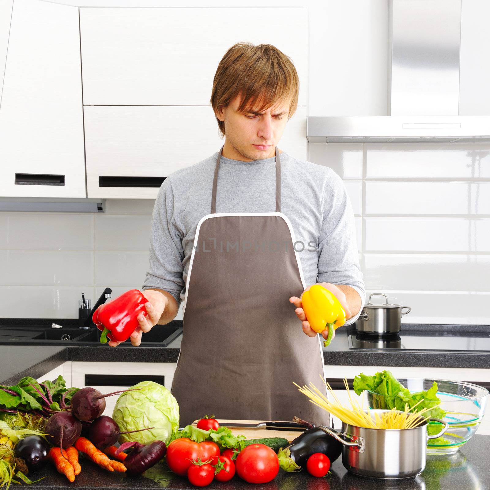 Man cooking in modern kitchen