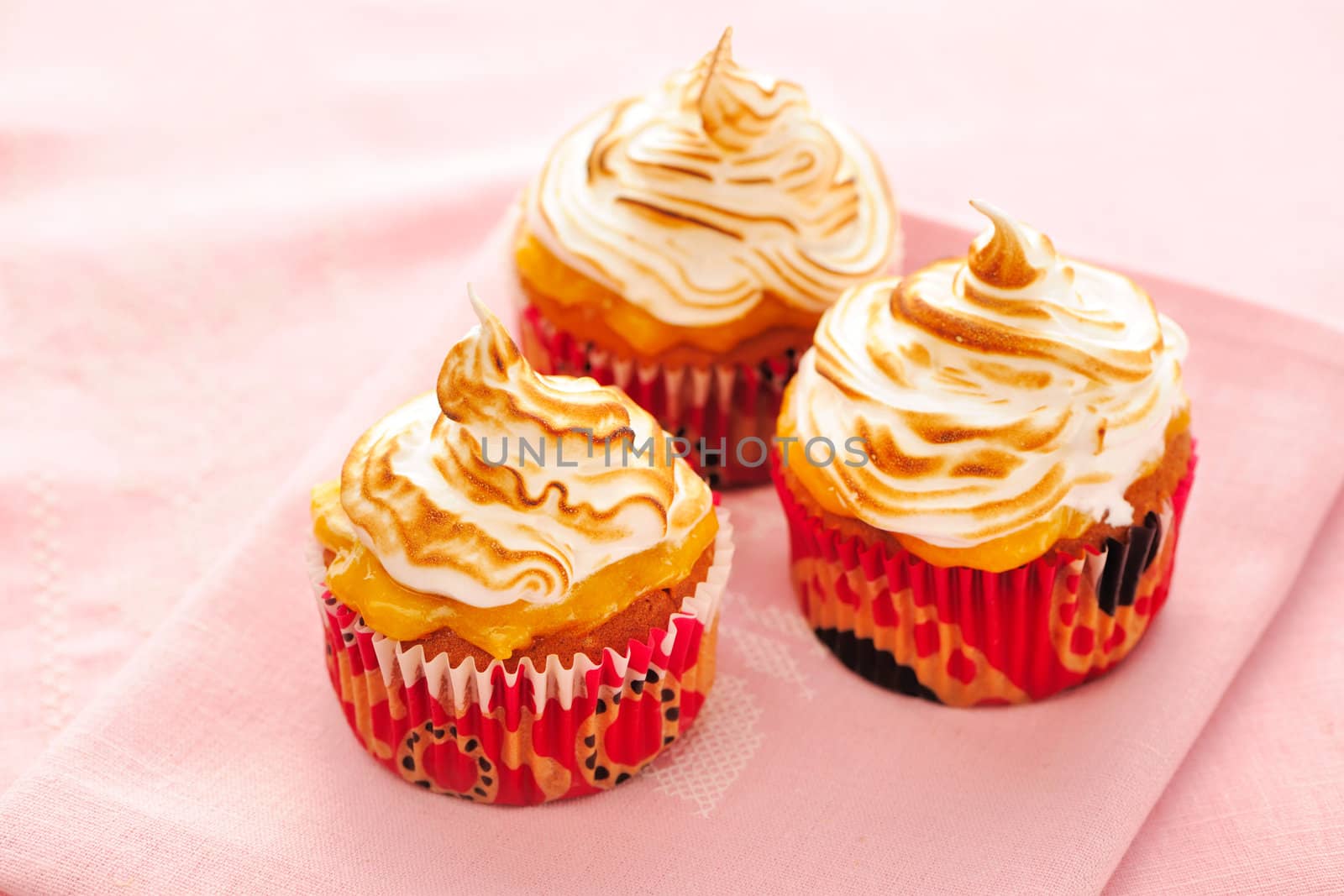 Cupcakes with whipped cream and icing