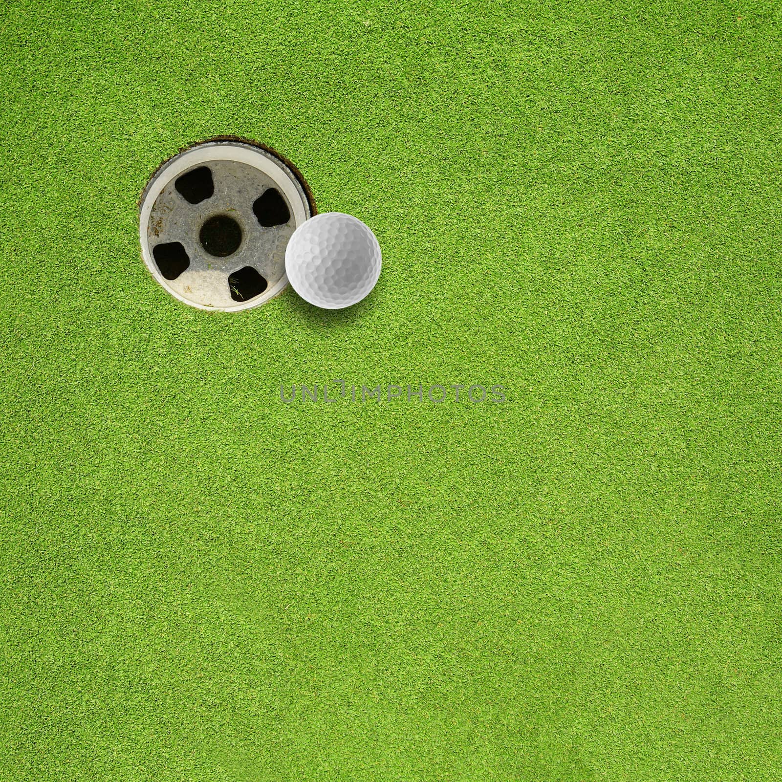 golf ball hole on a field by antpkr