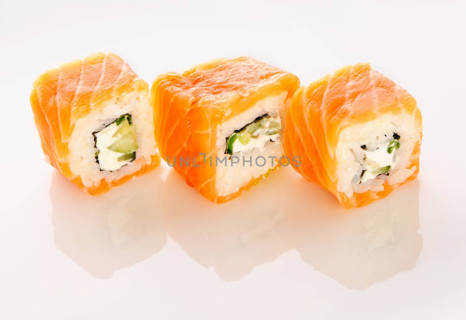 Sushi rolls over grey background