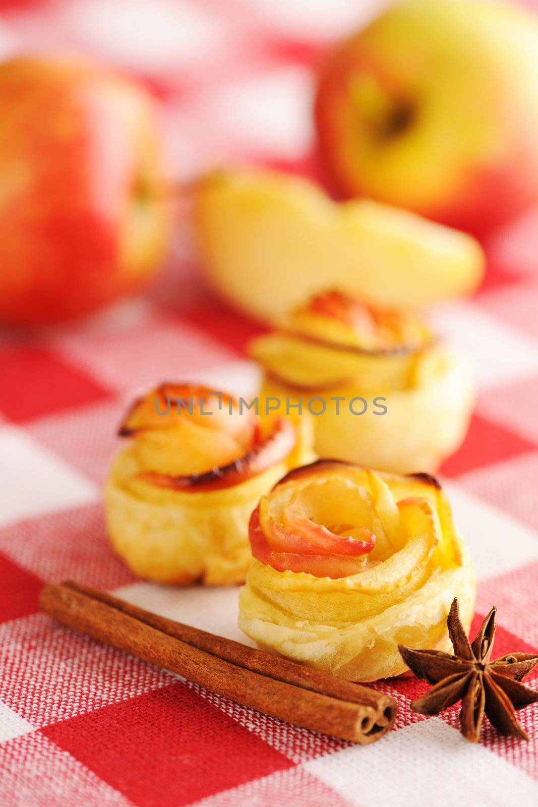 Delicious apple pies dessert on red cloth 