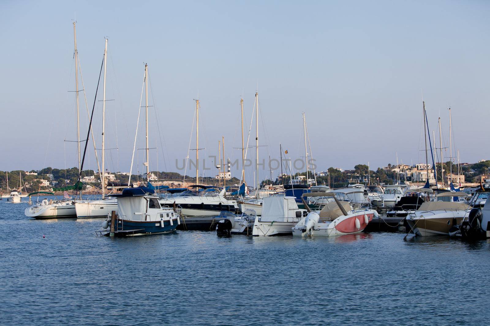 fishing boat in summer outside in sea at harbour background