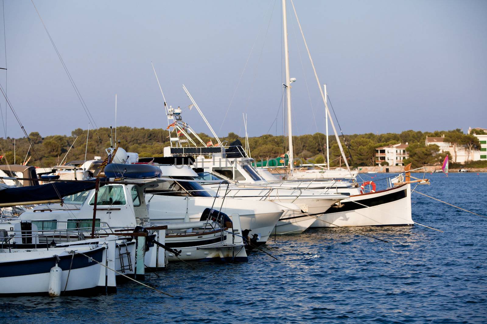 fishing boat in summer outside in sea at harbour by juniart