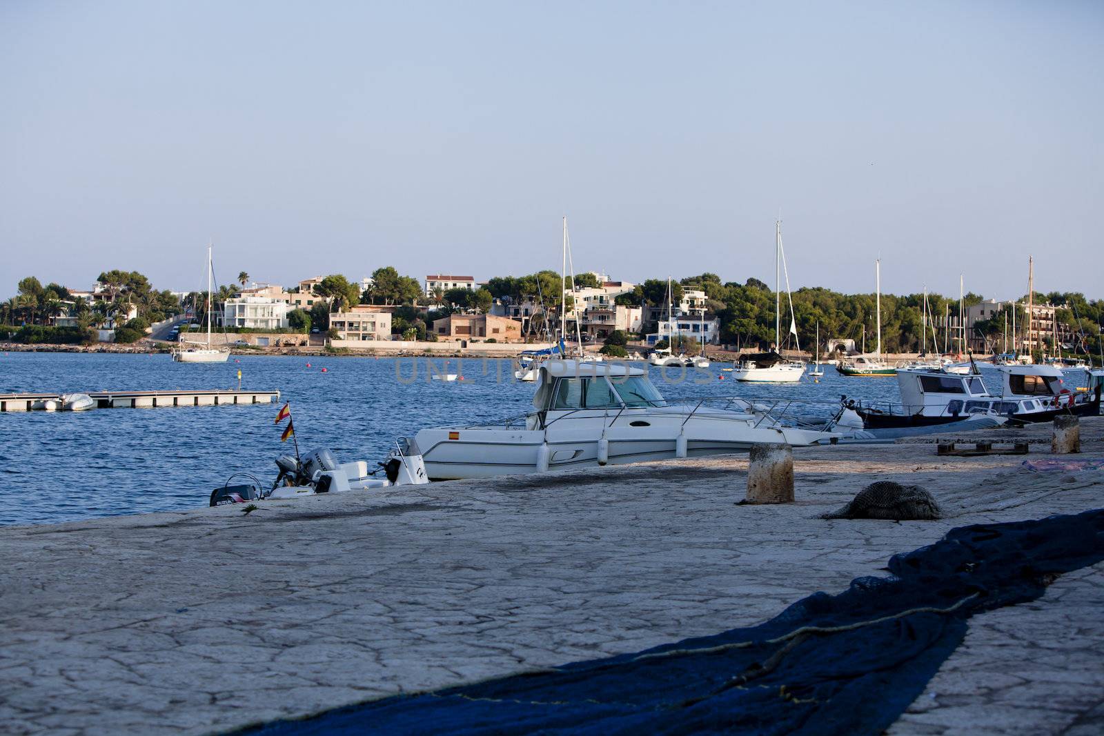 fishing boat in summer outside in sea at harbour background