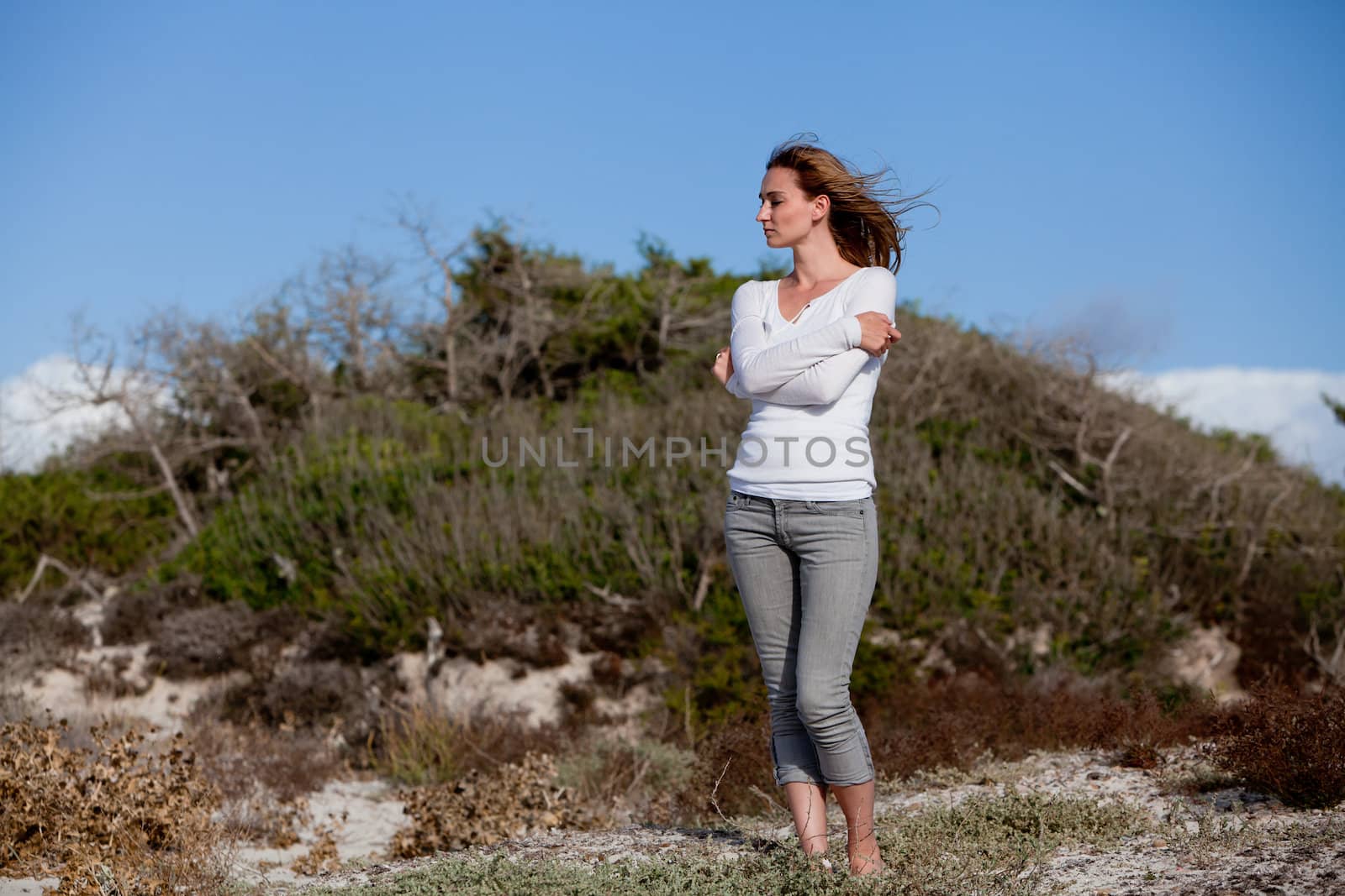 beautiful woman relax in summer outdoor in wind dune beach lifestyle