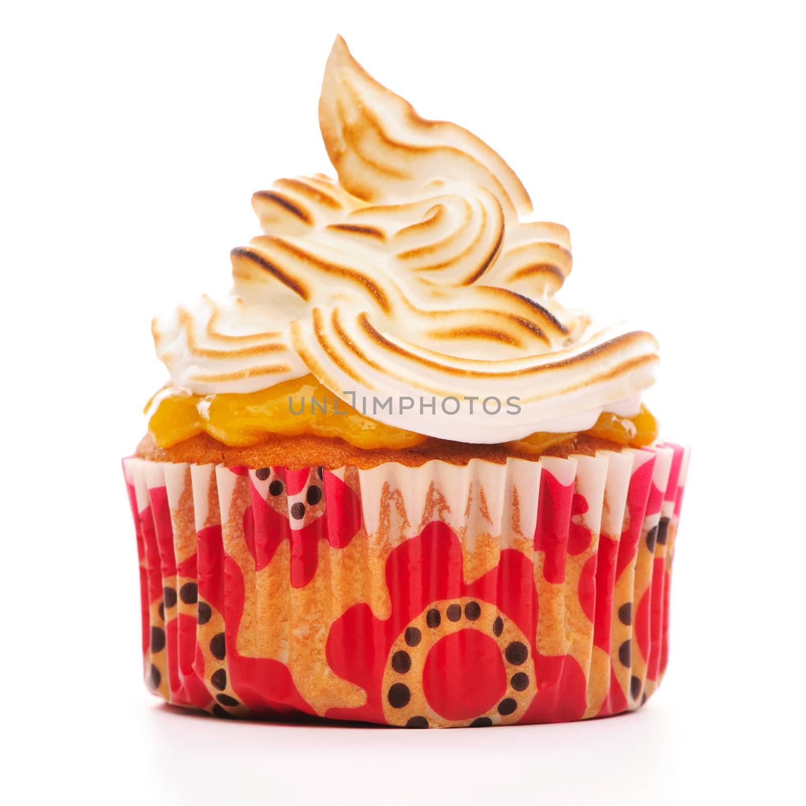 Cupcake with whipped cream isolated on white