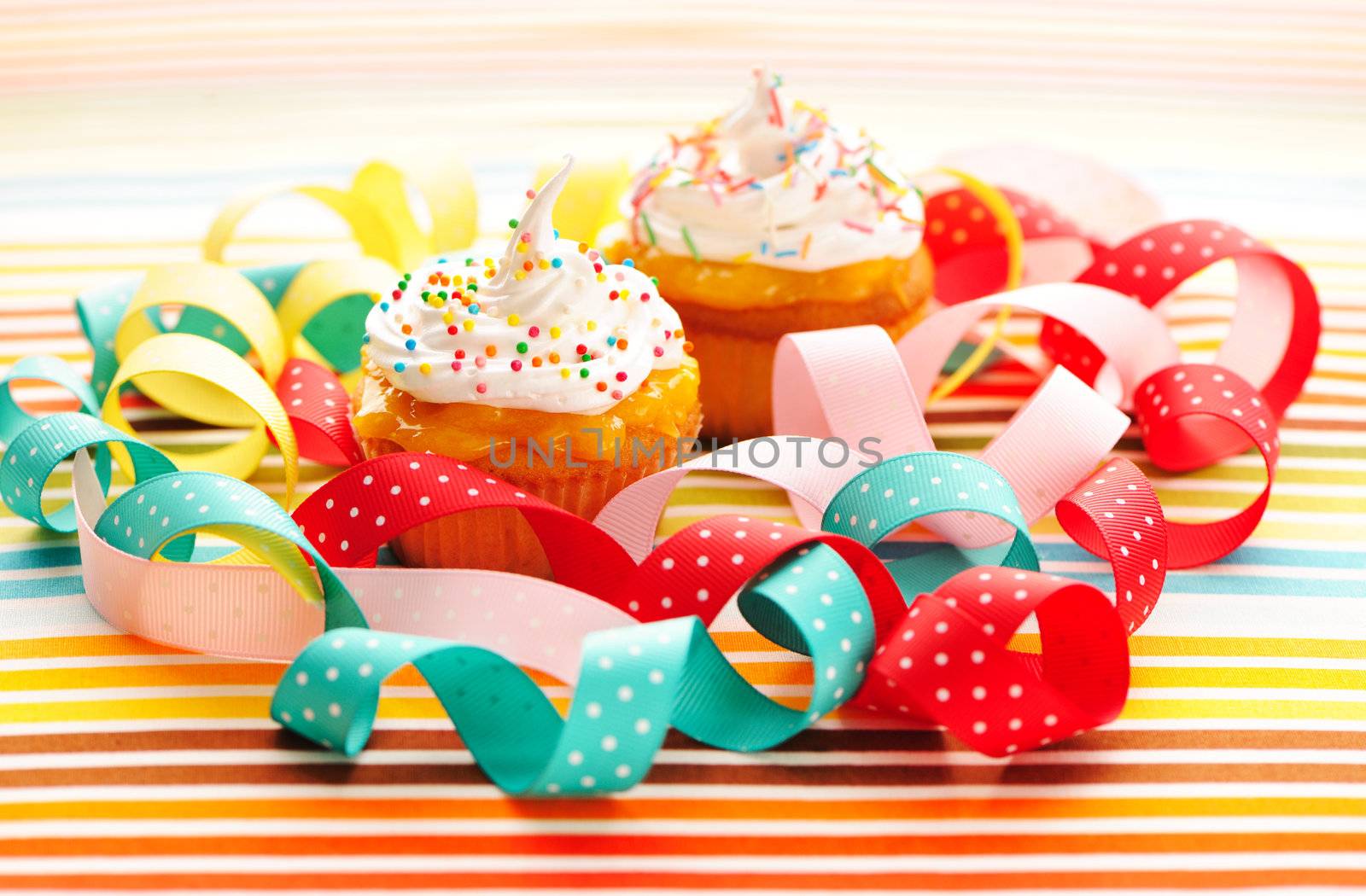 Cupcakes with whipped cream and icing