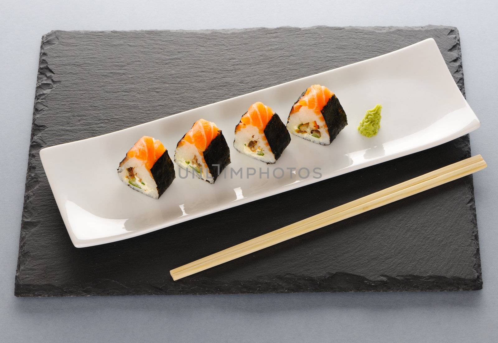 Sushi rolls on a slate plate