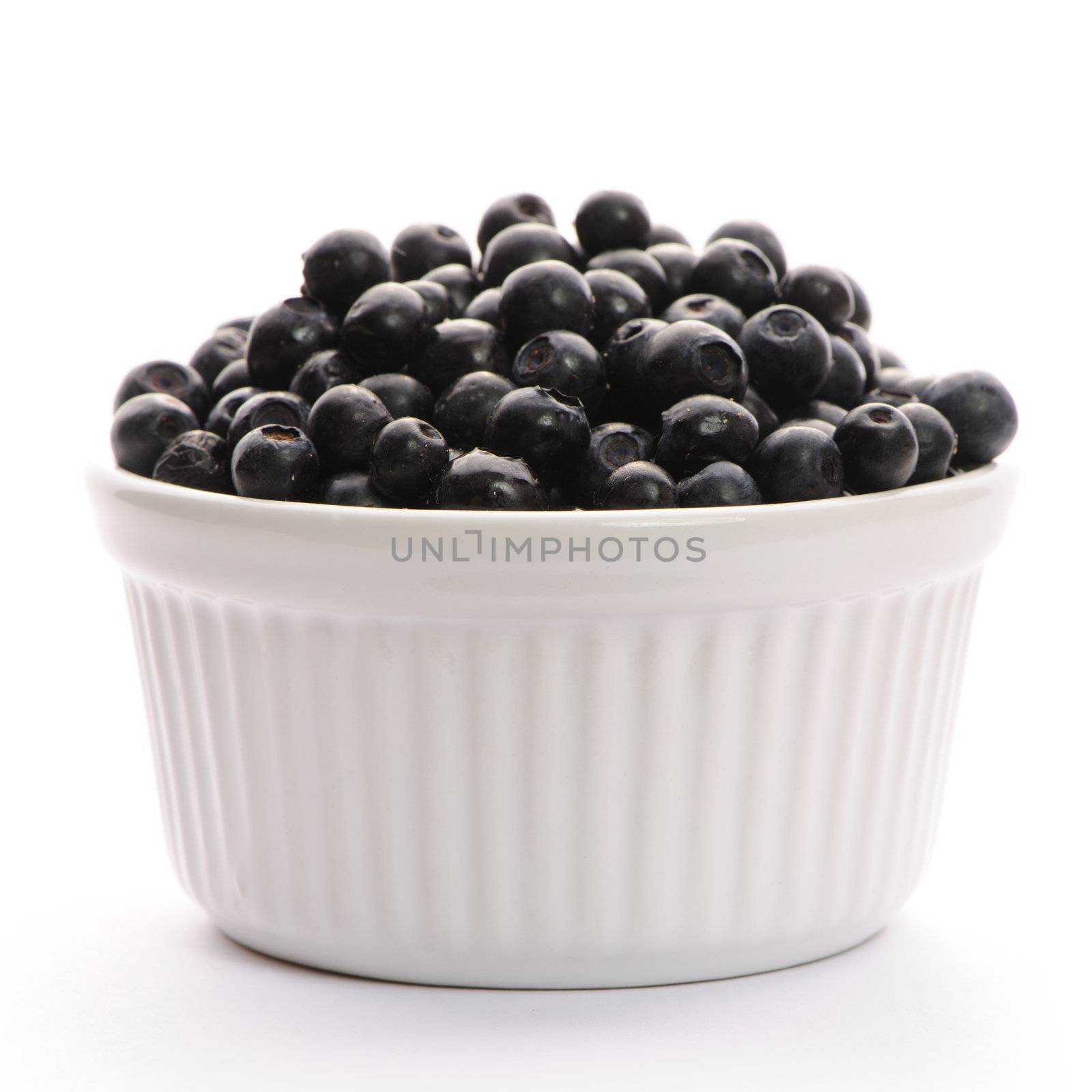 Blueberry in bowl isolated on white