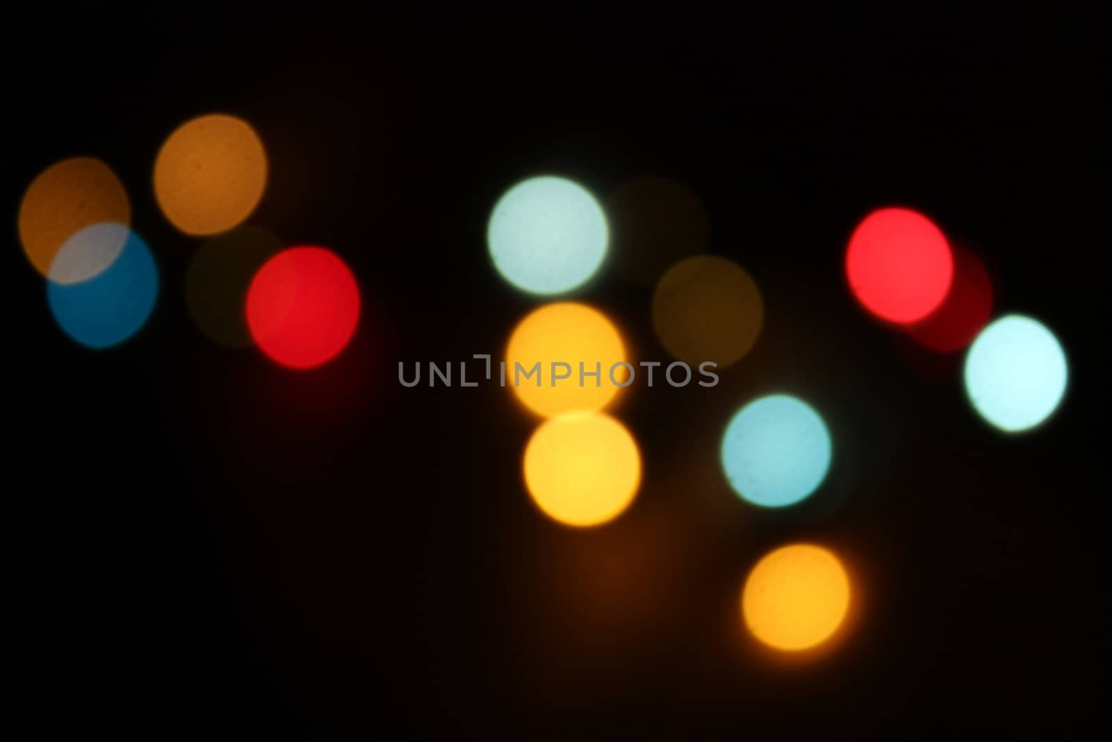 A background of colorful blur lights in spotted pattern