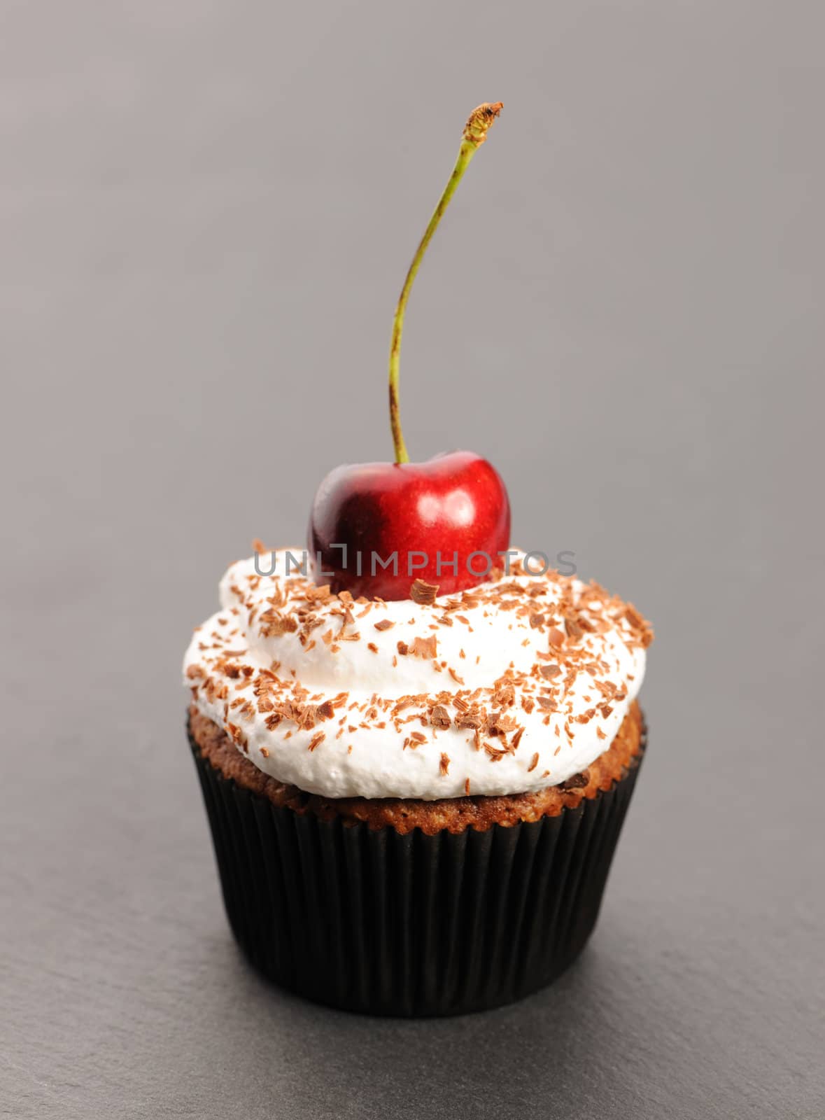 Cupcake with whipped cream and cherry by haveseen