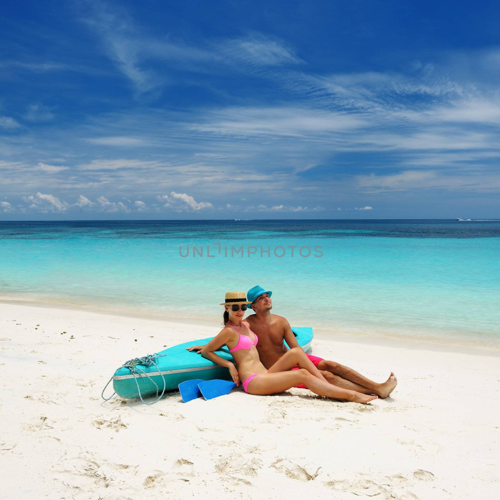 Couple on a beach by haveseen