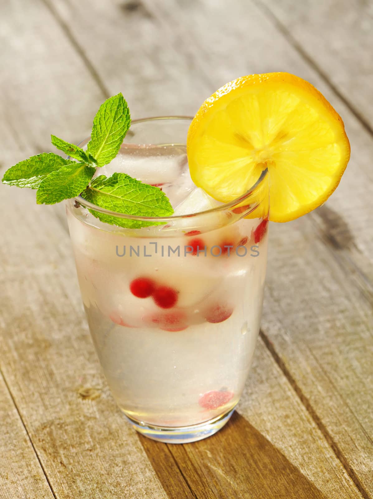 Fresh lemonade on wooden table