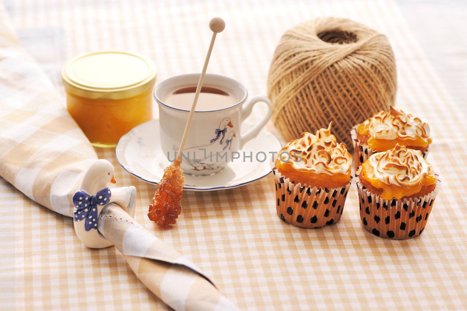 Cupcakes with whipped cream and icing