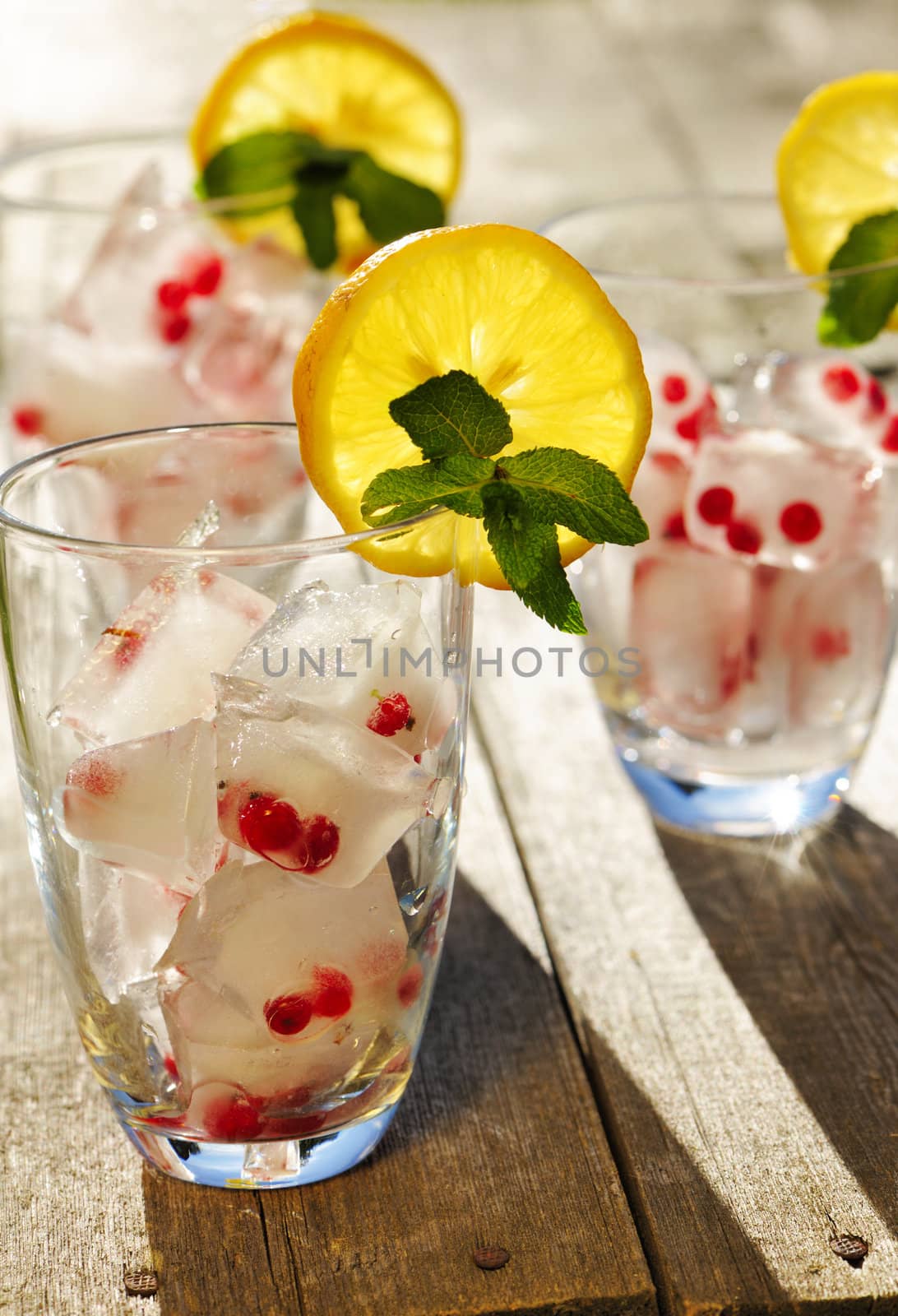 Fresh lemonade on wooden table