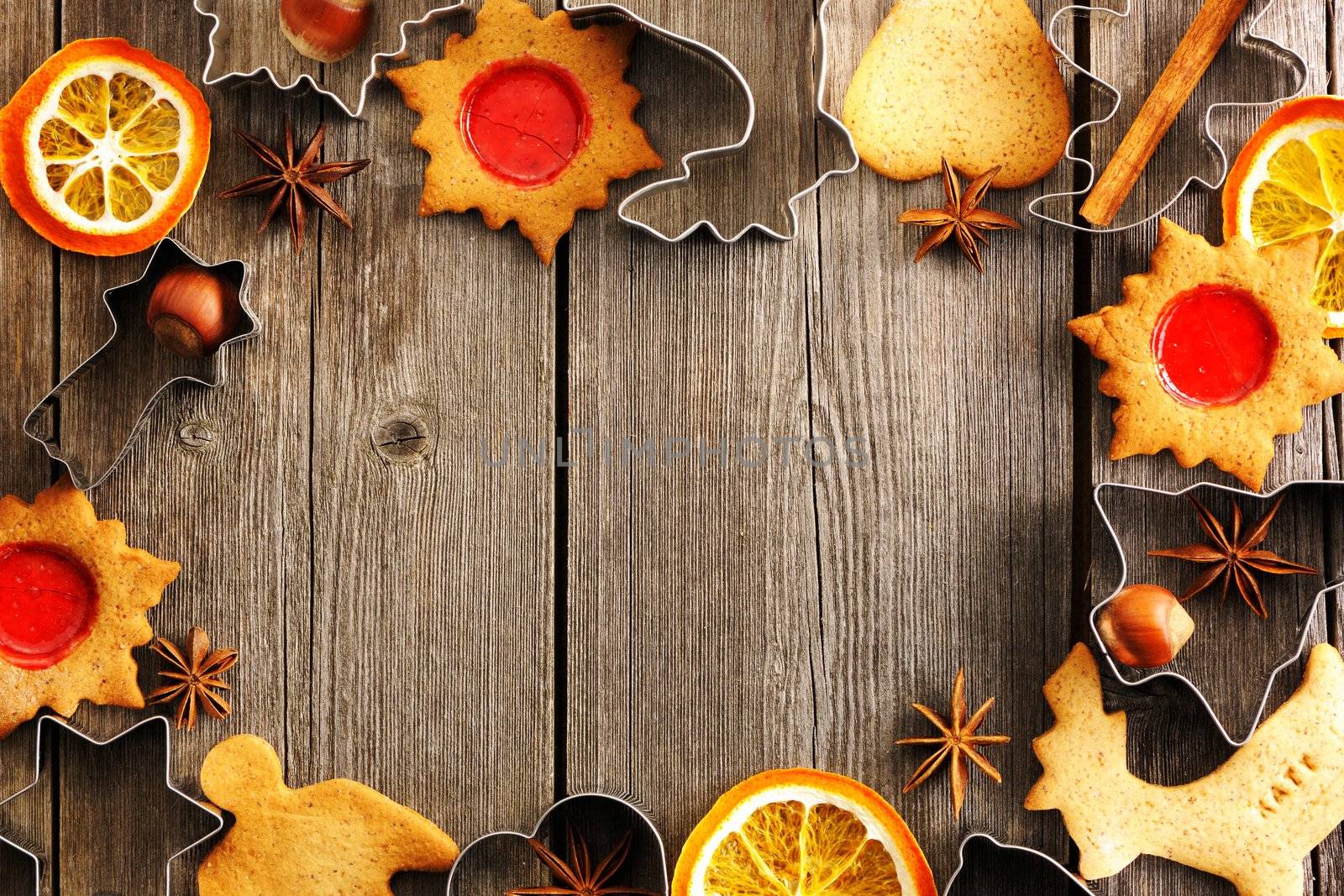 Christmas homemade gingerbread cookies over wooden table