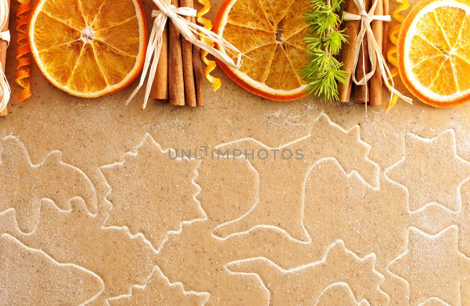 Christmas spices over homemade gingerbread dough