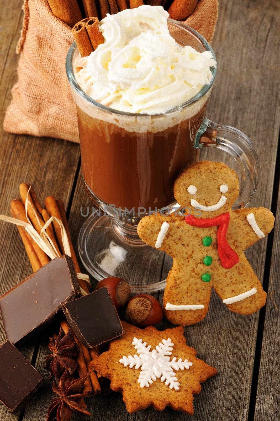 Glass of hot chocolate on wooden table