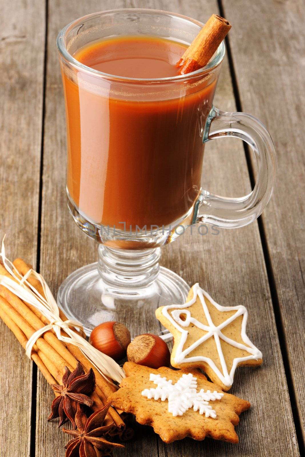 Glass of hot chocolate on wooden table