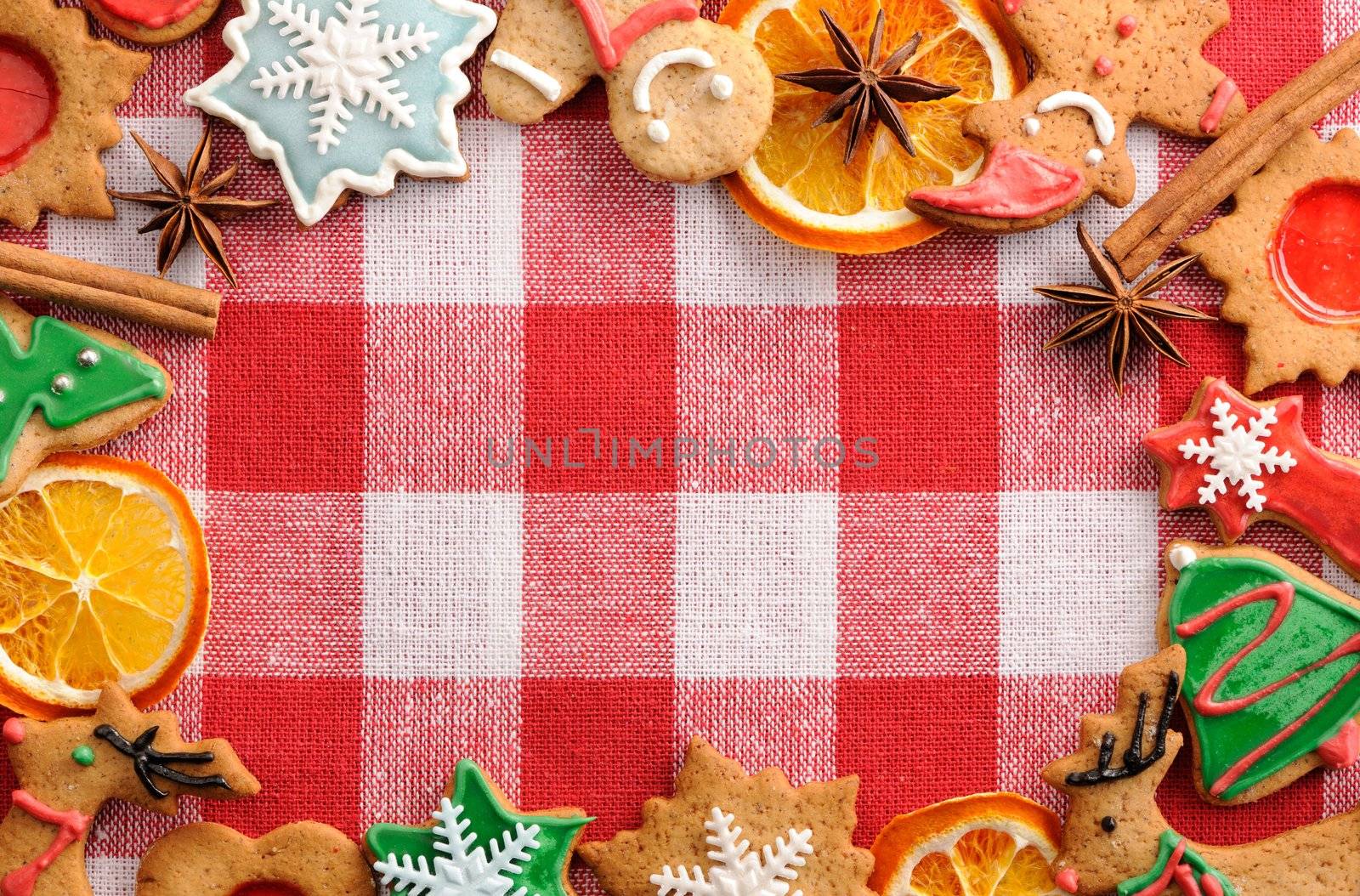 Christmas gingerbread cookies over tablecloth