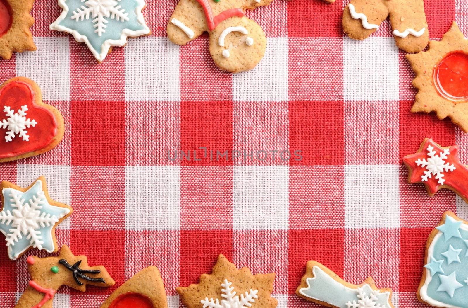 Christmas gingerbread cookies over tablecloth
