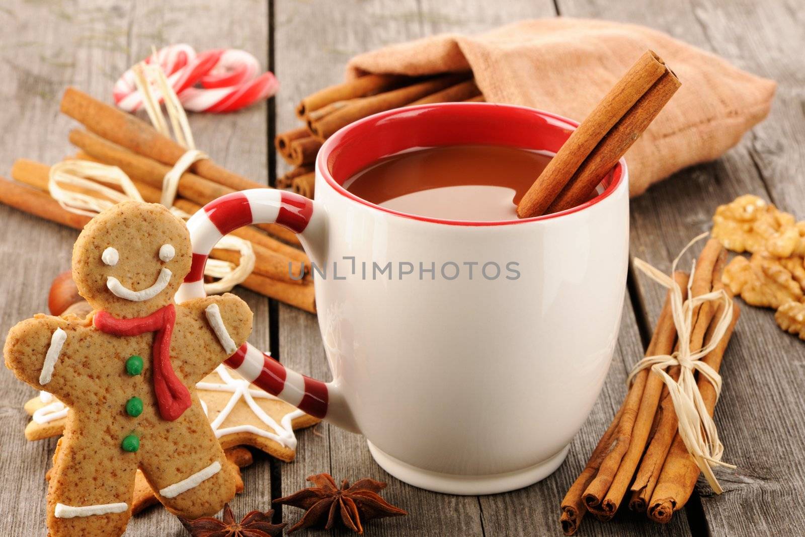 Mug of hot chocolate on wooden table