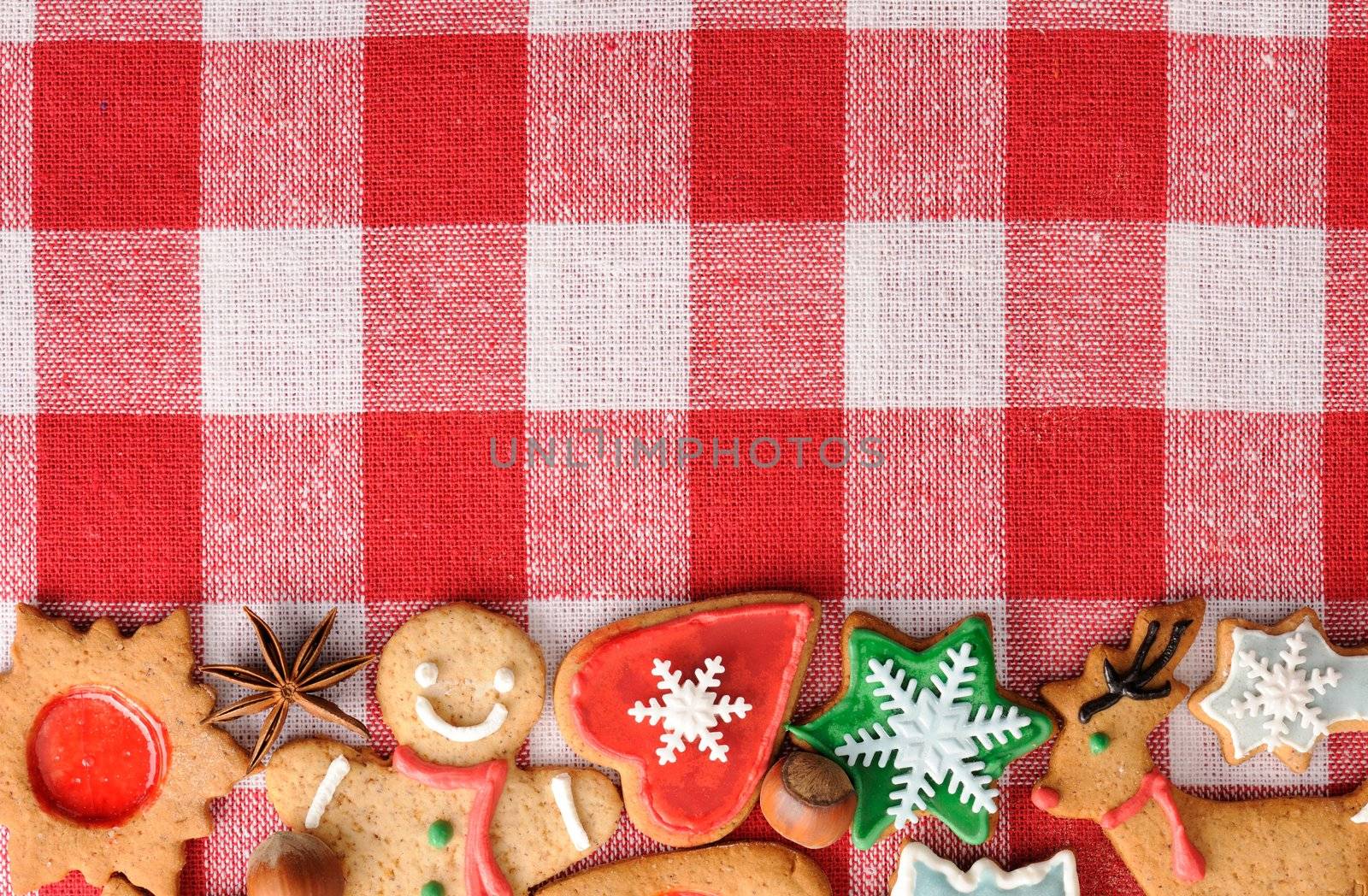 Christmas gingerbread cookies over tablecloth