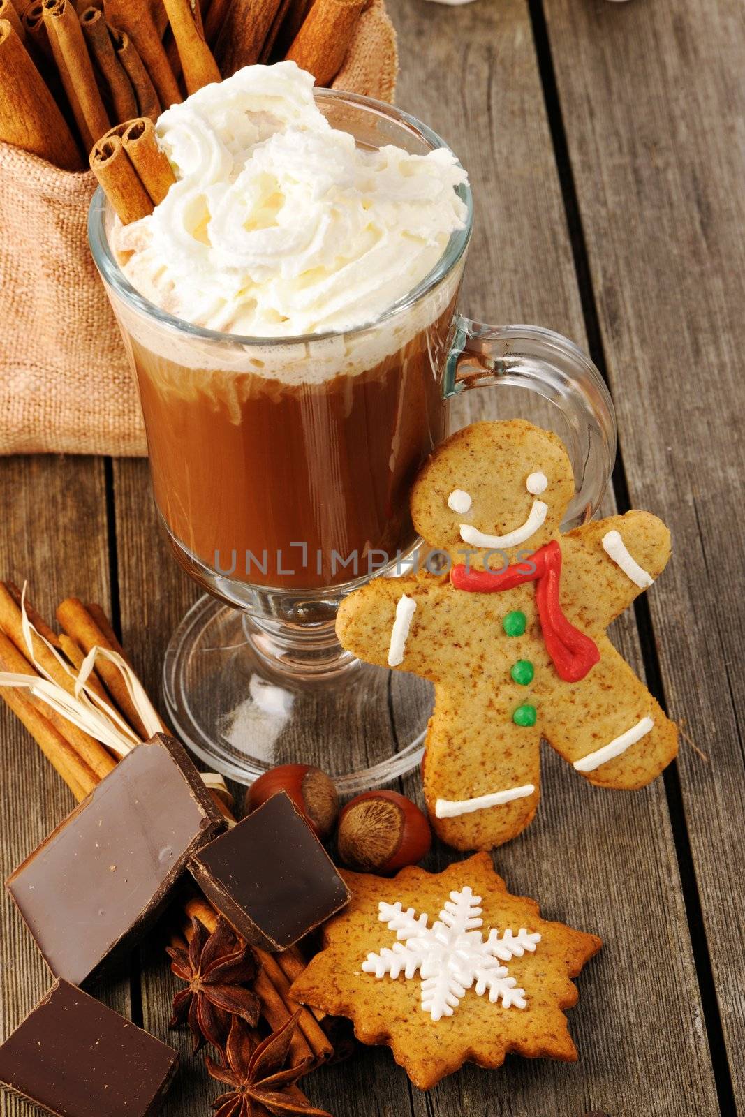 Glass of hot chocolate on wooden table