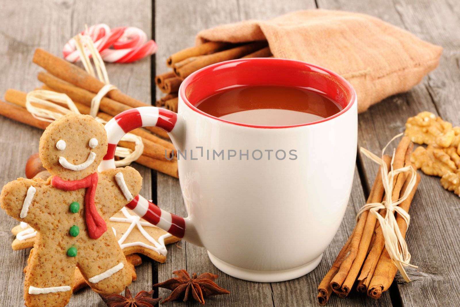 Mug of hot chocolate on wooden table