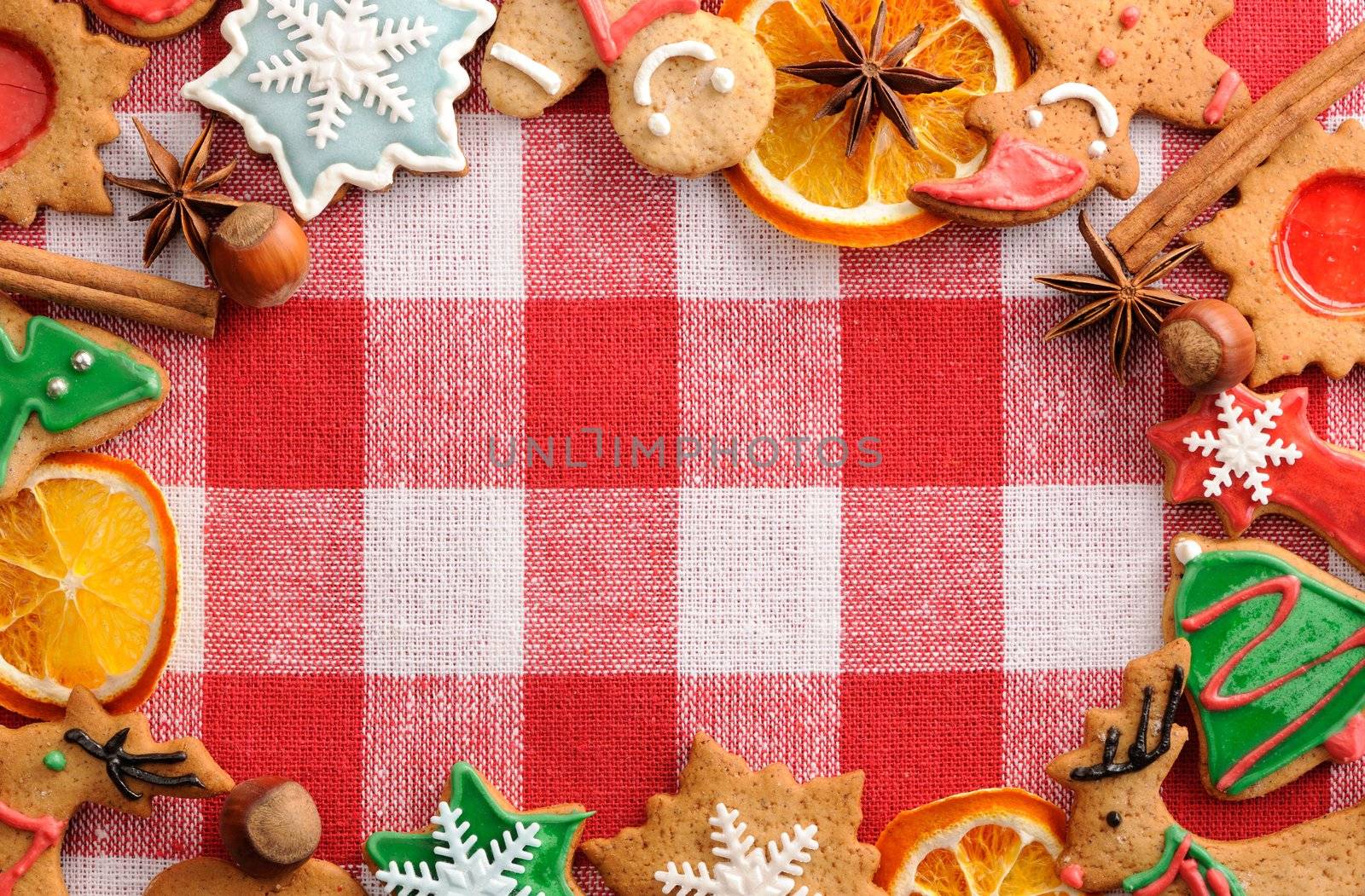 Christmas gingerbread cookies over tablecloth