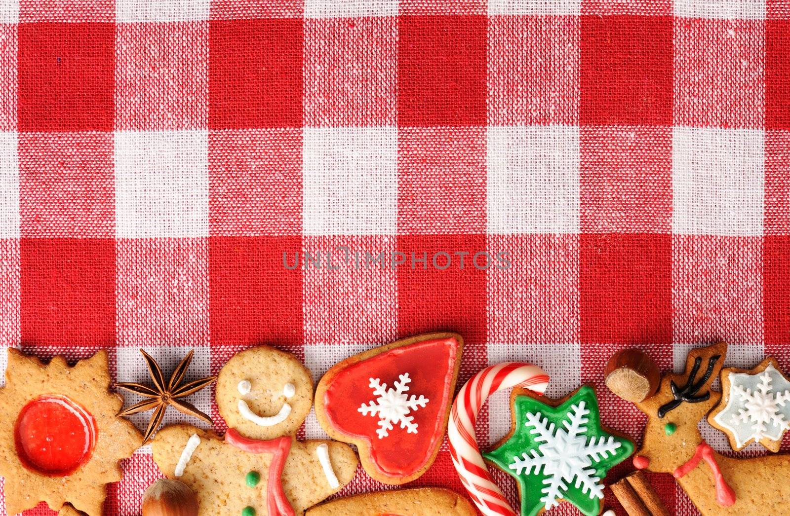 Christmas gingerbread cookies over tablecloth