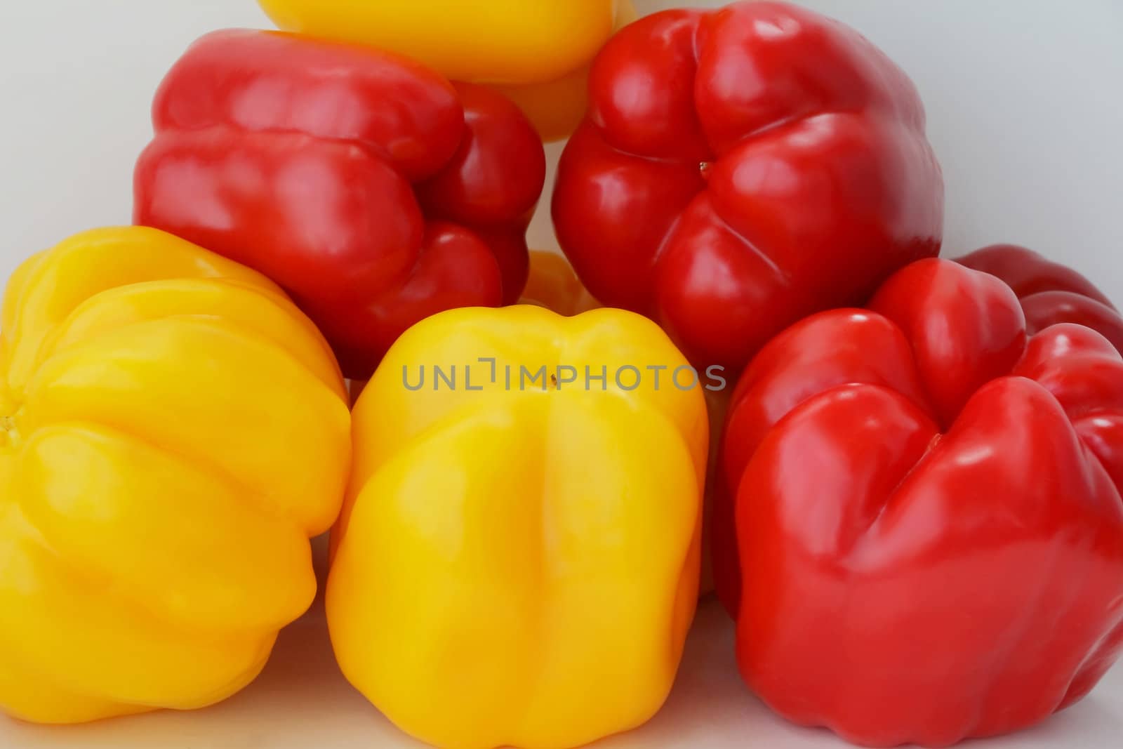 Image of red and yellow raw pepper