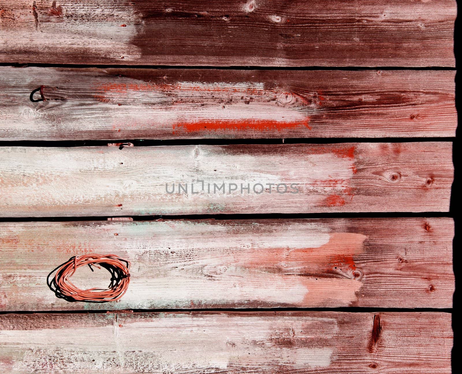 Old wooden rural house wall made of plank board backdrop background.