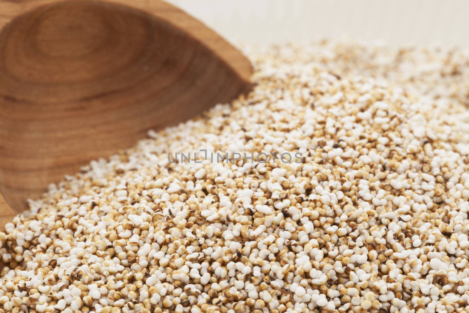 Home popped amaranth seeds with booden spoon.
