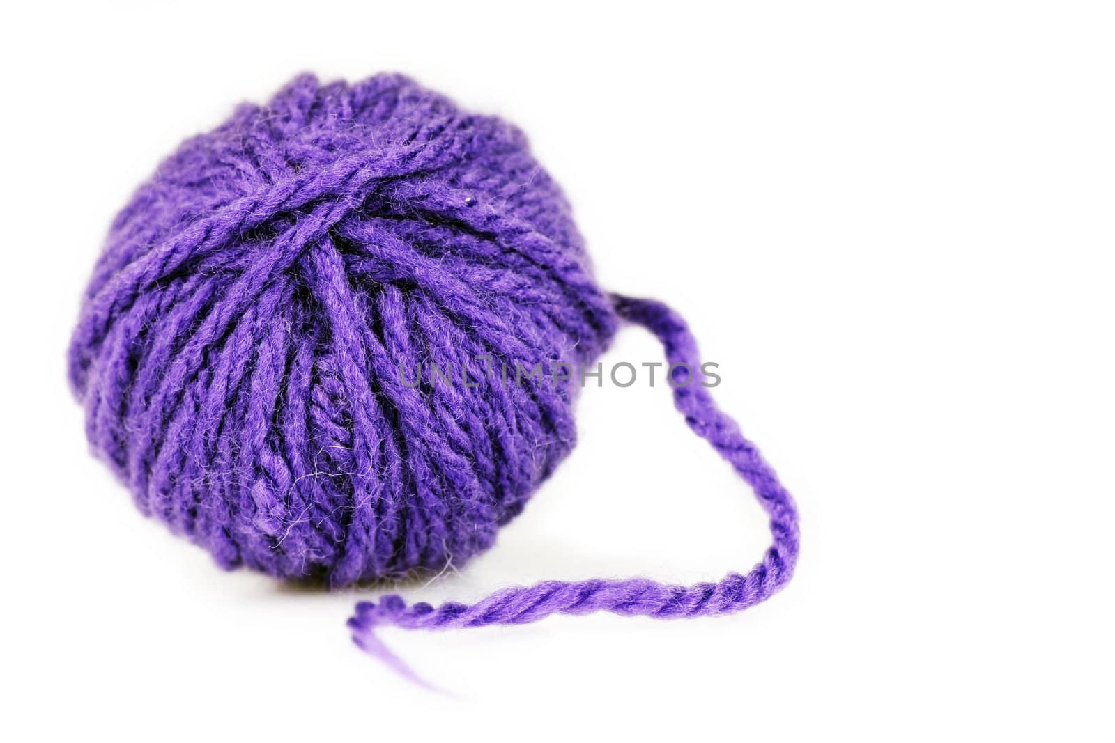 Ball of intense purple wool or yarn by Mirage3