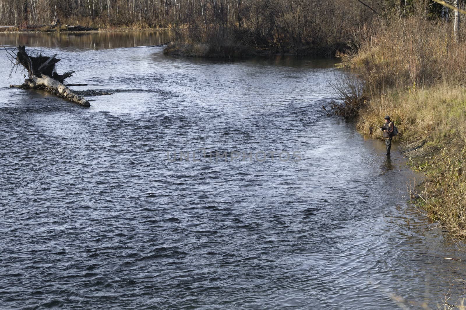 Fishing on the mountain river with fast current