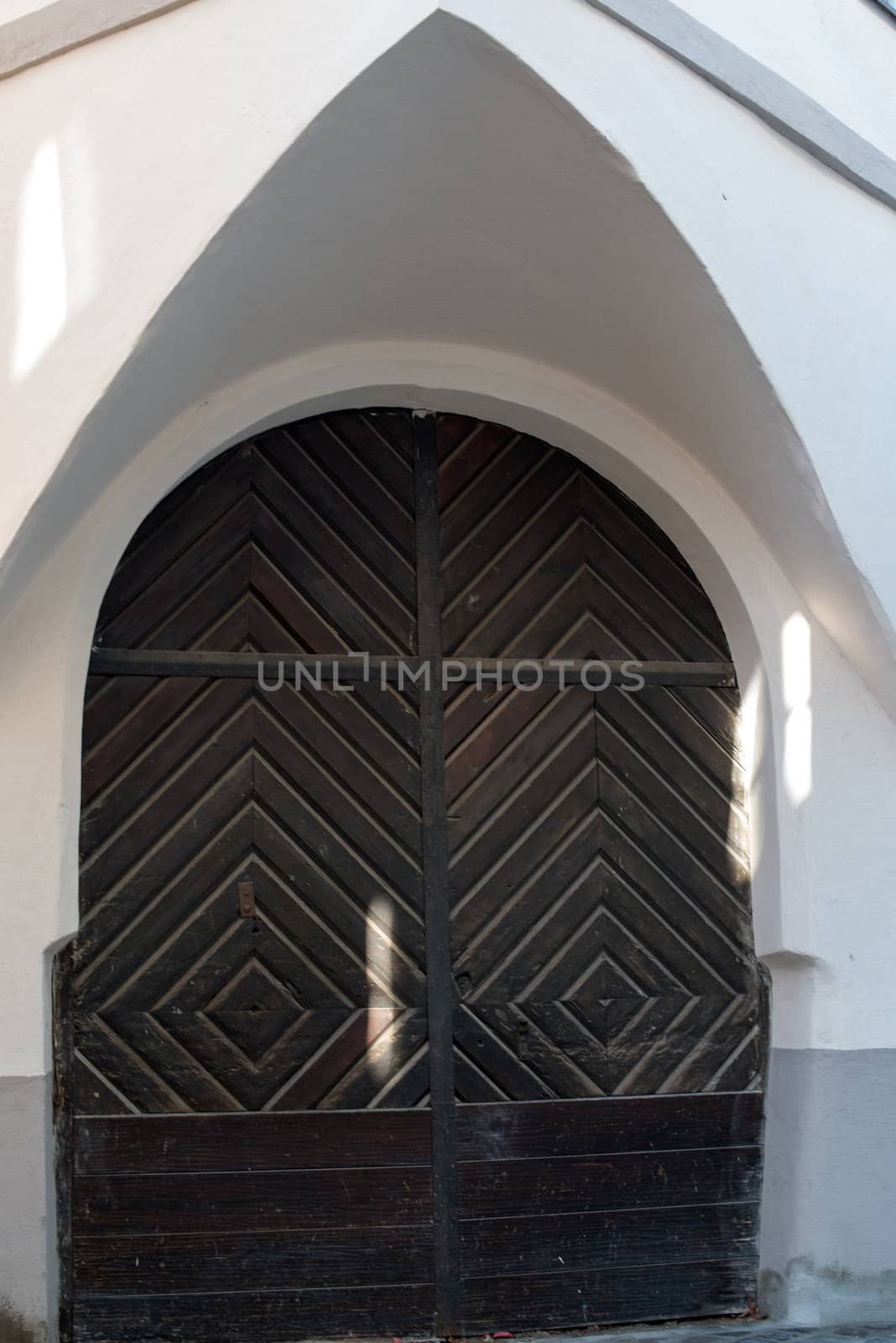 Old wooden door in old town of Augsburg, Germany