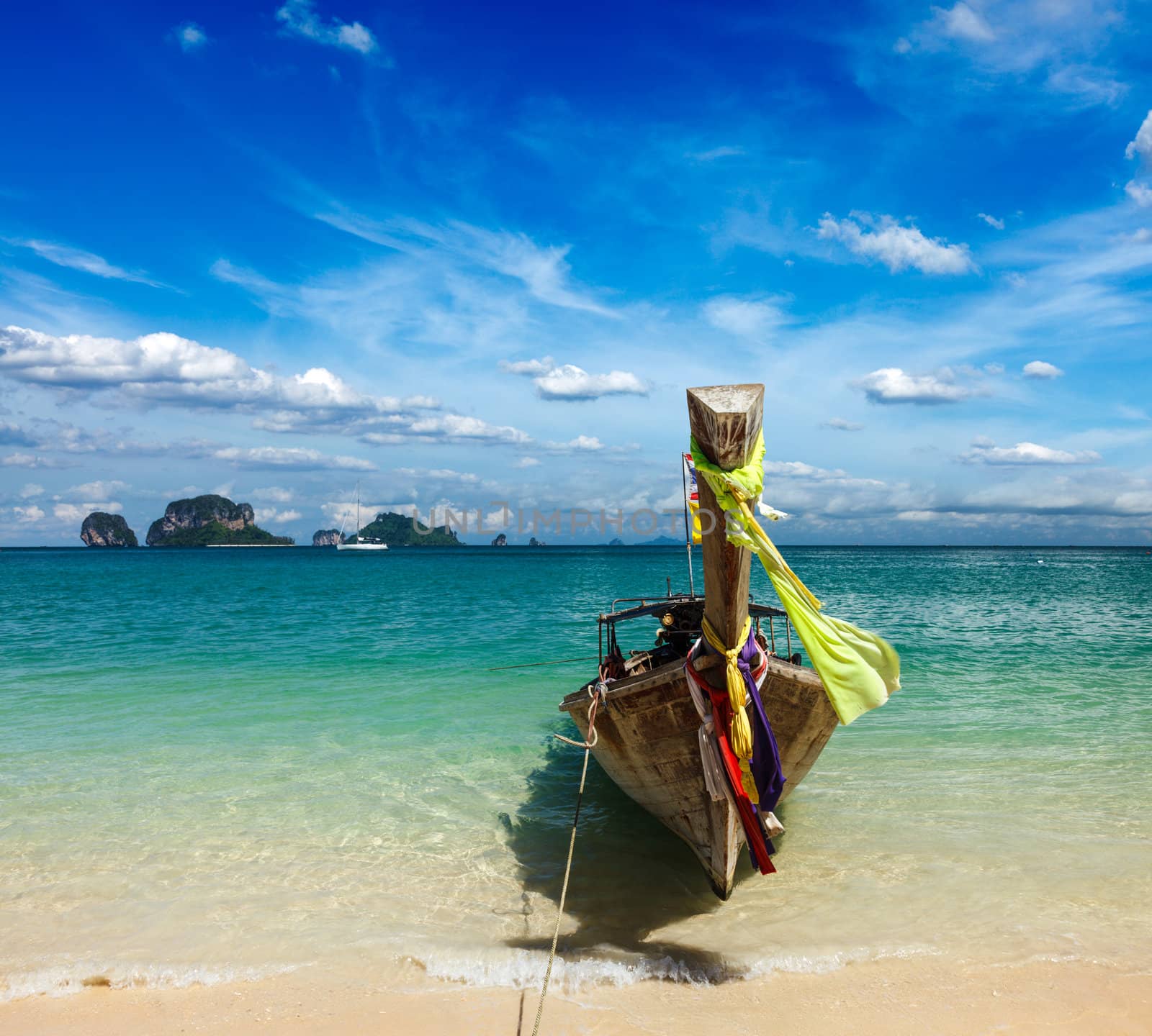 Long tail boat on tropical beach, Krabi, Thailand