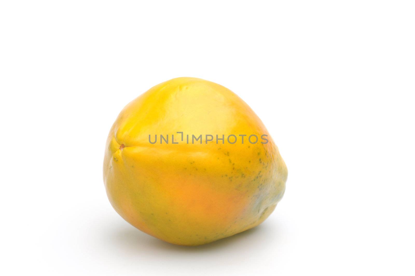 Whole ripe papaya photographed on a white background.