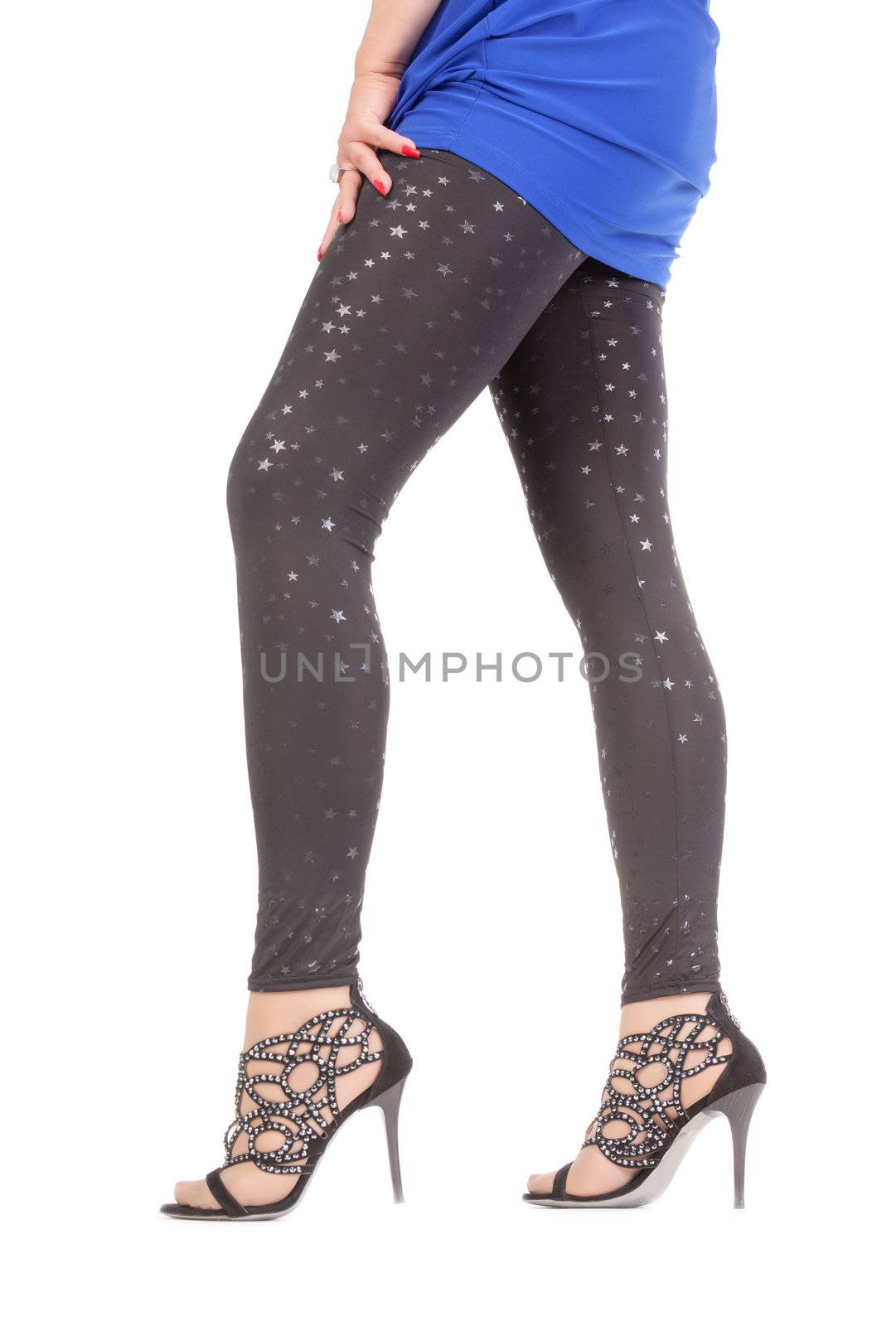 Sexy stylish legs in shimmering black leggins by Discovod