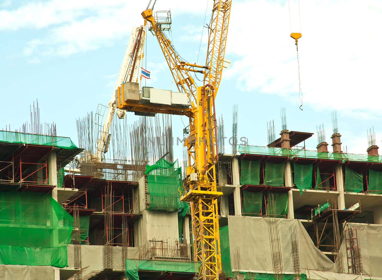 Construction of residential building with multiple floors.