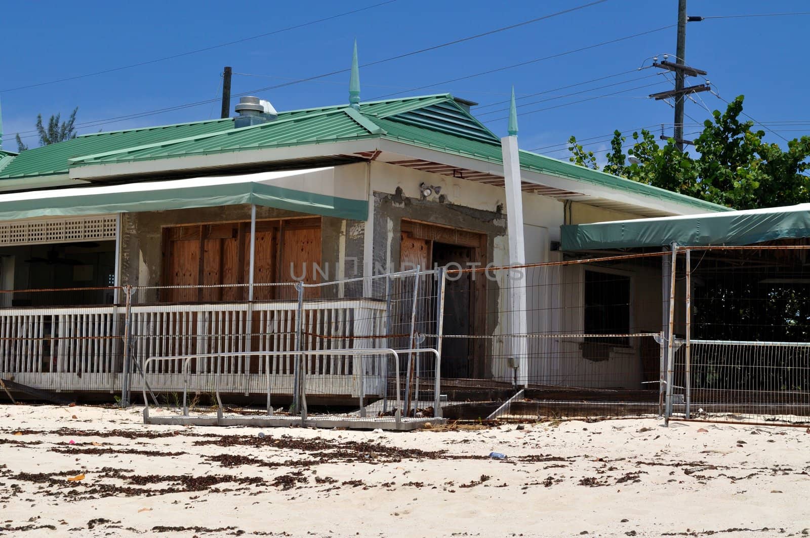 Old, abandoned beach house located on the Seven Mile Beach in Grand Cayman.