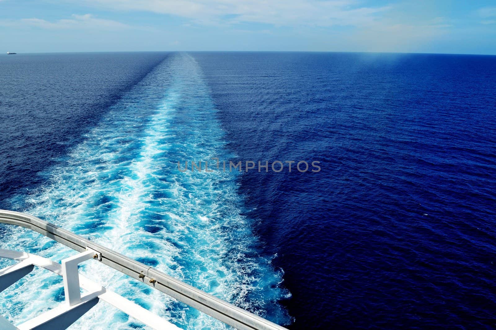 The wake of a cruise ship sailing in the Caribbean Sea.