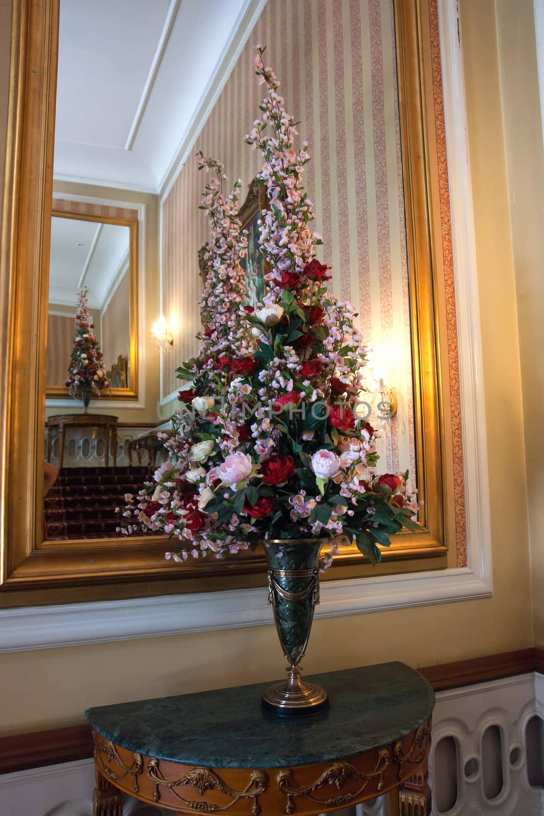 Lobby reception area of a classical castle hotel with beautiful flowers